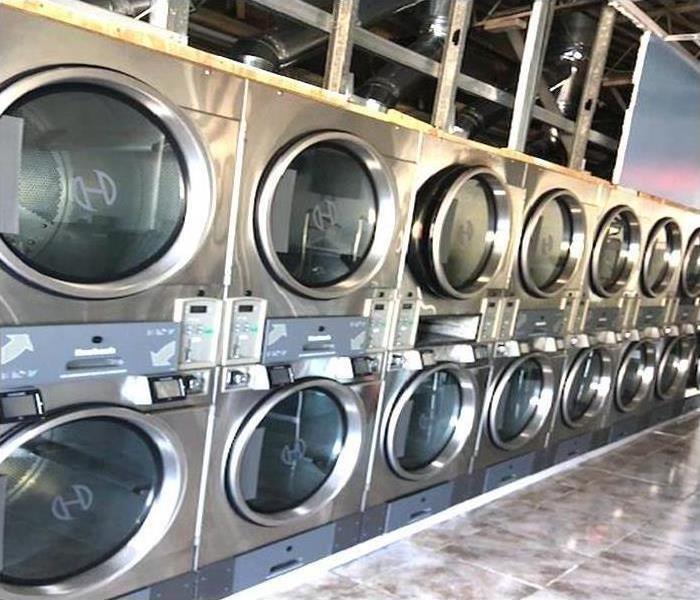 commercial laundromat after property restoration and fire damage cleanup