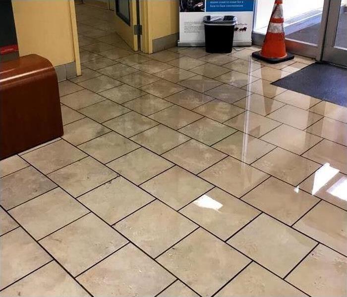 Flooded commercial floor after an evening storm