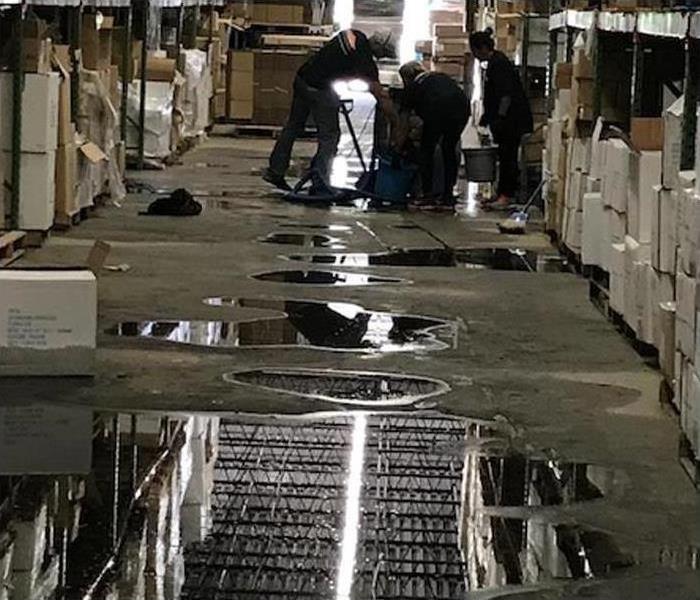 water damage and flooded warehouse 